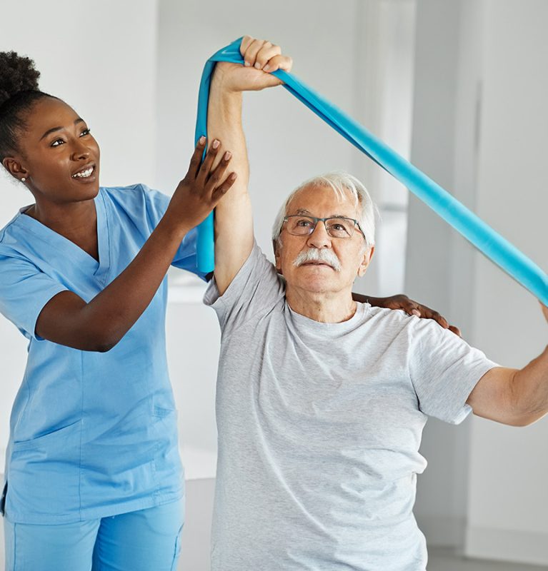 caregiver helping with exercises